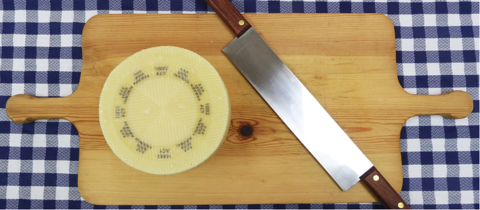 Cutting Manchego cheese